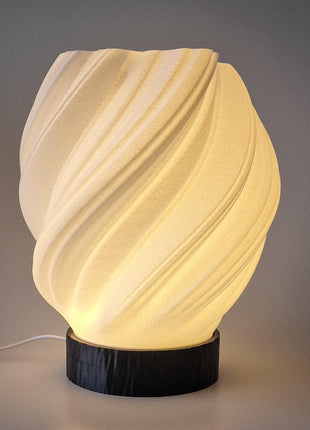 Cellastra Glow tafellamp met golvende kap en warm licht